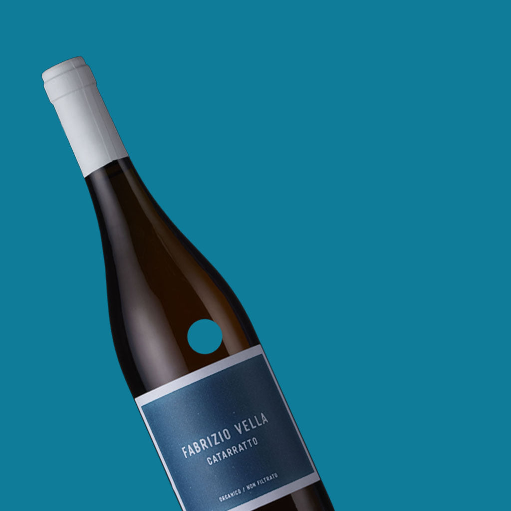 Catarratto wine - orange natural wine lifestyle shot - Sicily Italy - Fabrizio Vella